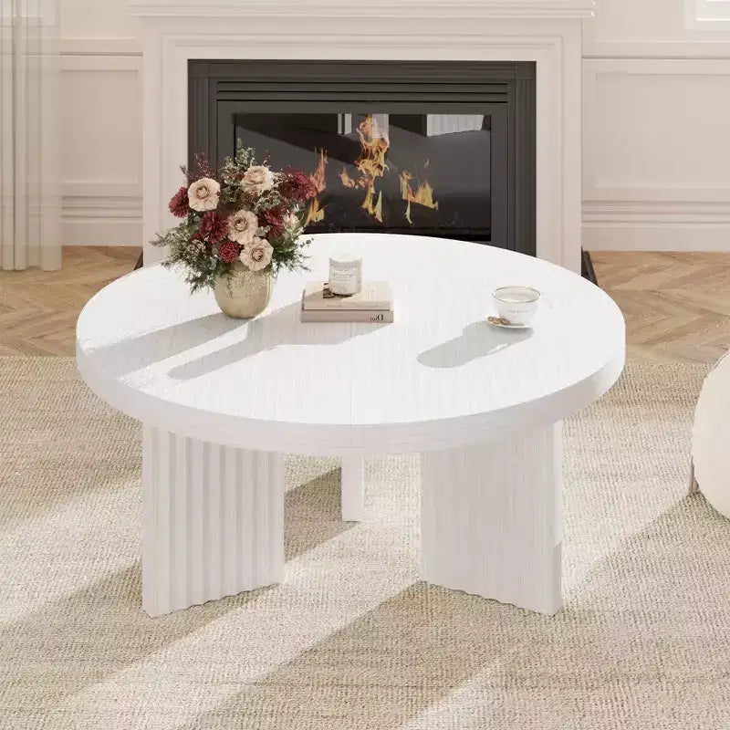 Table basse ronde de 84,8 cm avec plateau épais et pieds cannelés