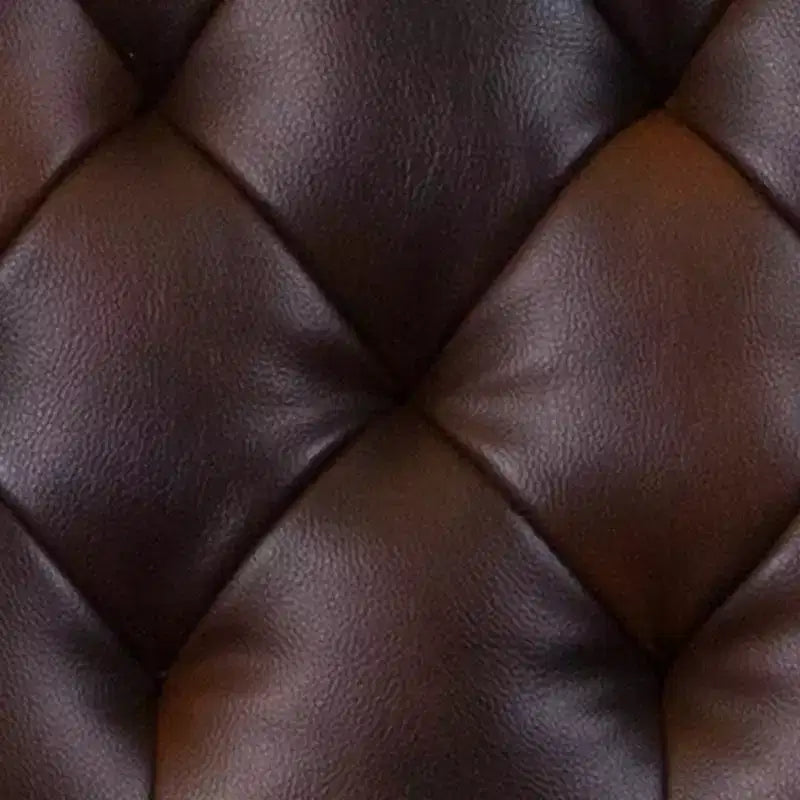 Fauteuil de salon capitonné en cuir reconstitué avec accoudoirs inclinés