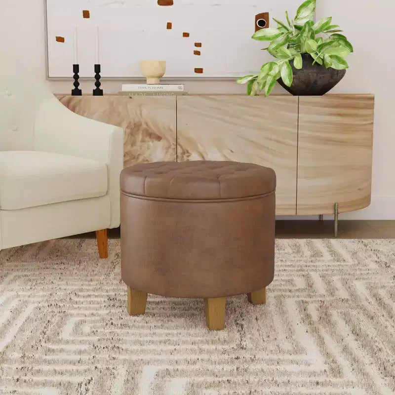 Pouf de rangement rond capitonné en similicuir